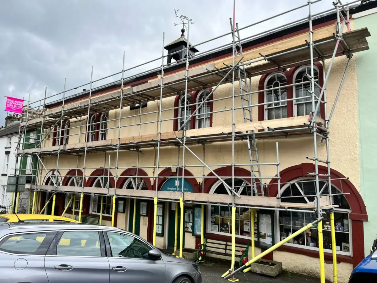 Full-height scaffolding on period building facade for renovation in South Lakes