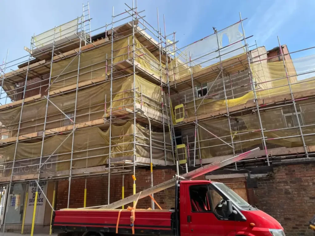 Full house scaffold wrap for roof and wall renovation in South Lakes
