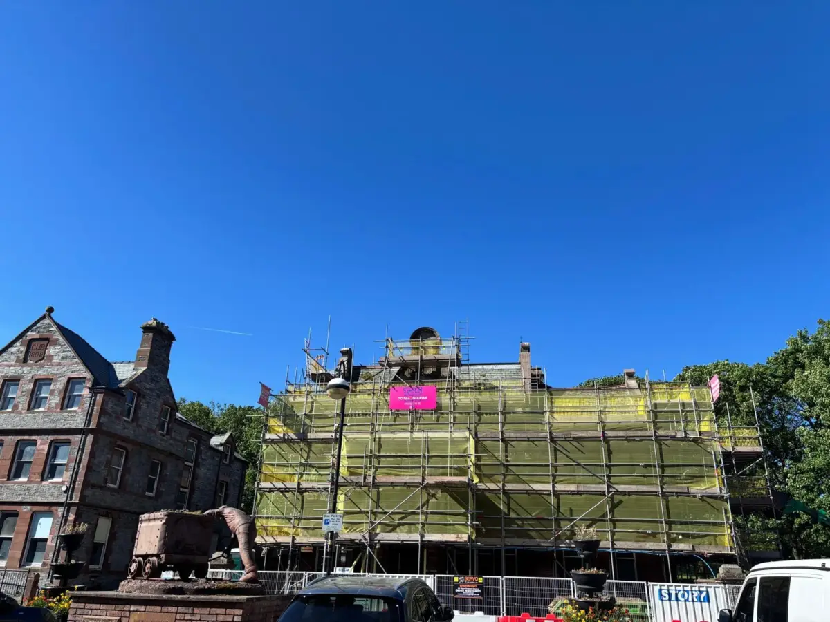 Scaffold access on period shop front for renovation under Millom Town Deal
