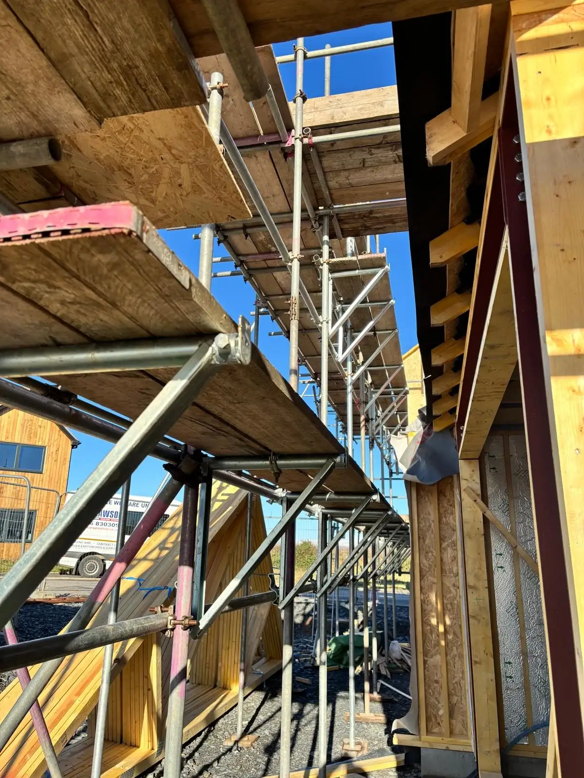 Scaffold access on timber frame new build for roof construction in Bootle, Cumbria
