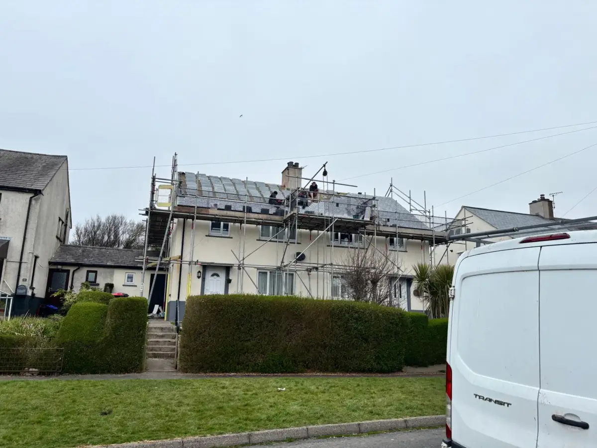 Independent scaffolding on semi-detached house for gutter replacement in Millom
