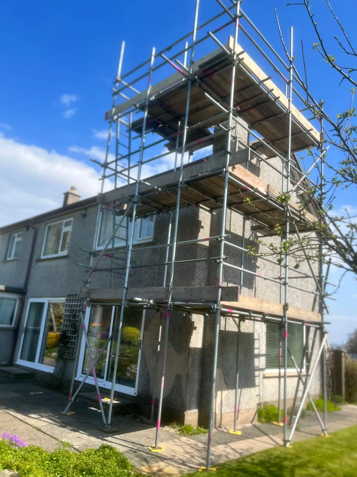 Chimney stack repair scaffolding on terraced house in South Lakeland