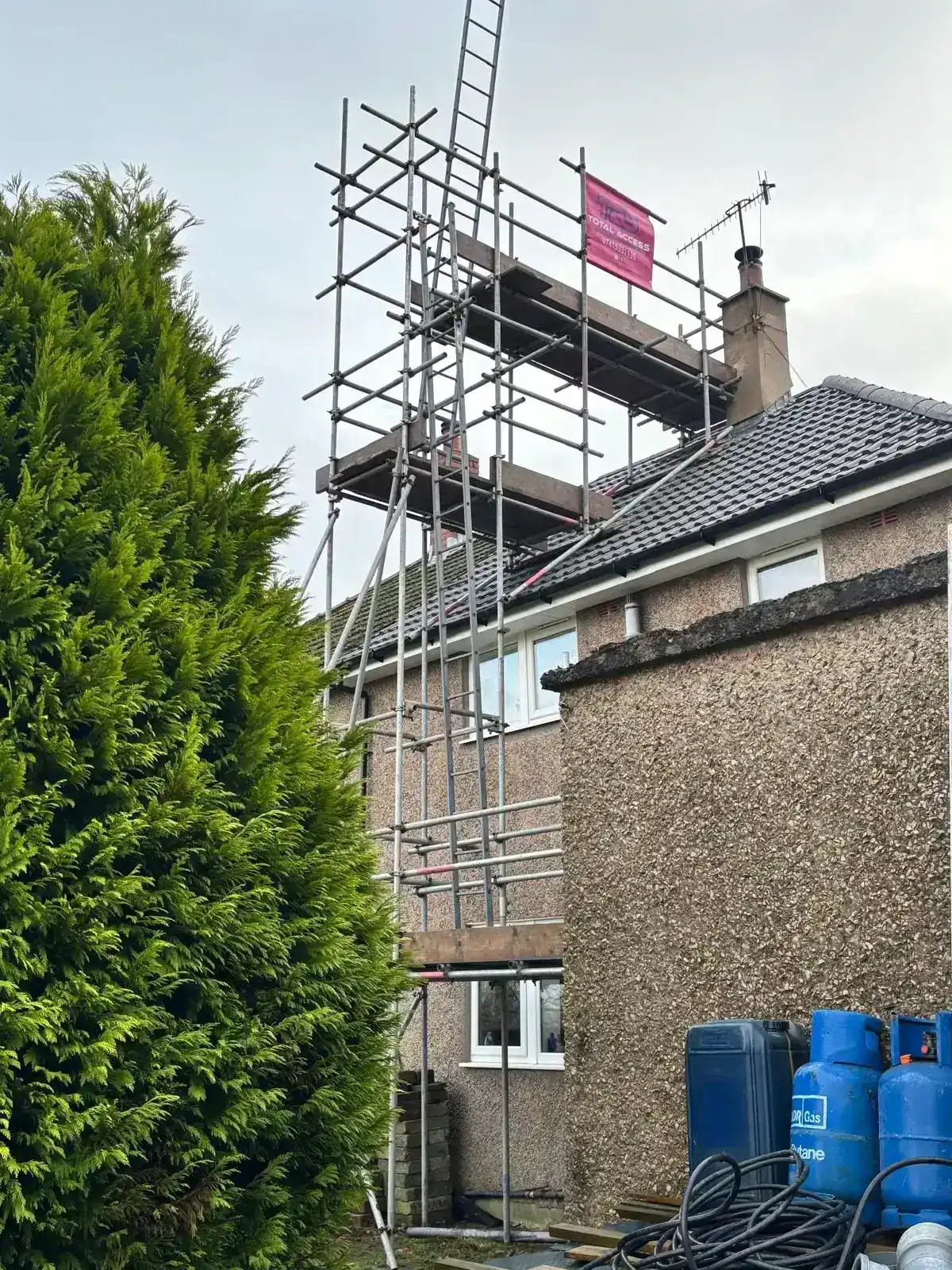 Independent chimney scaffold tower for flue liner installation in Cumbria