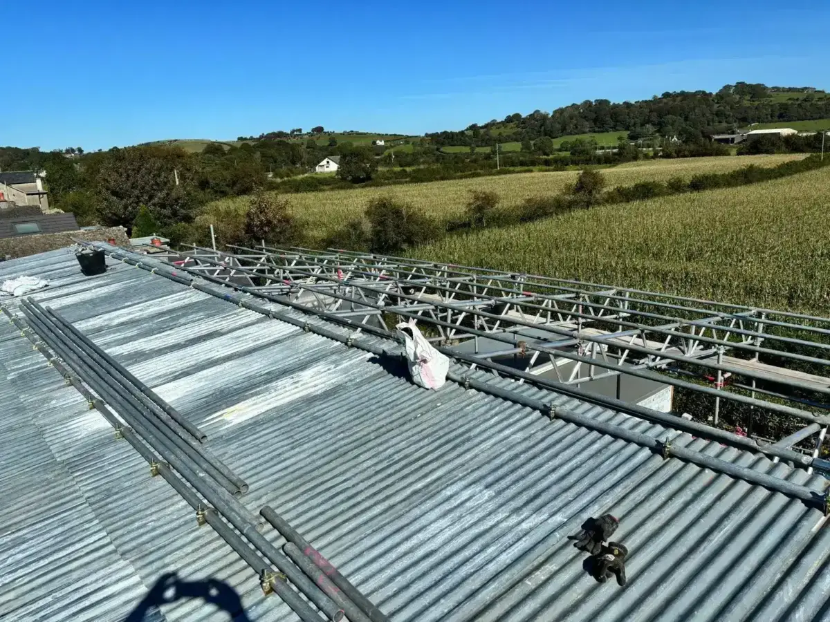 Canopy scaffolding with translucent roof panels for natural light in Ulverston