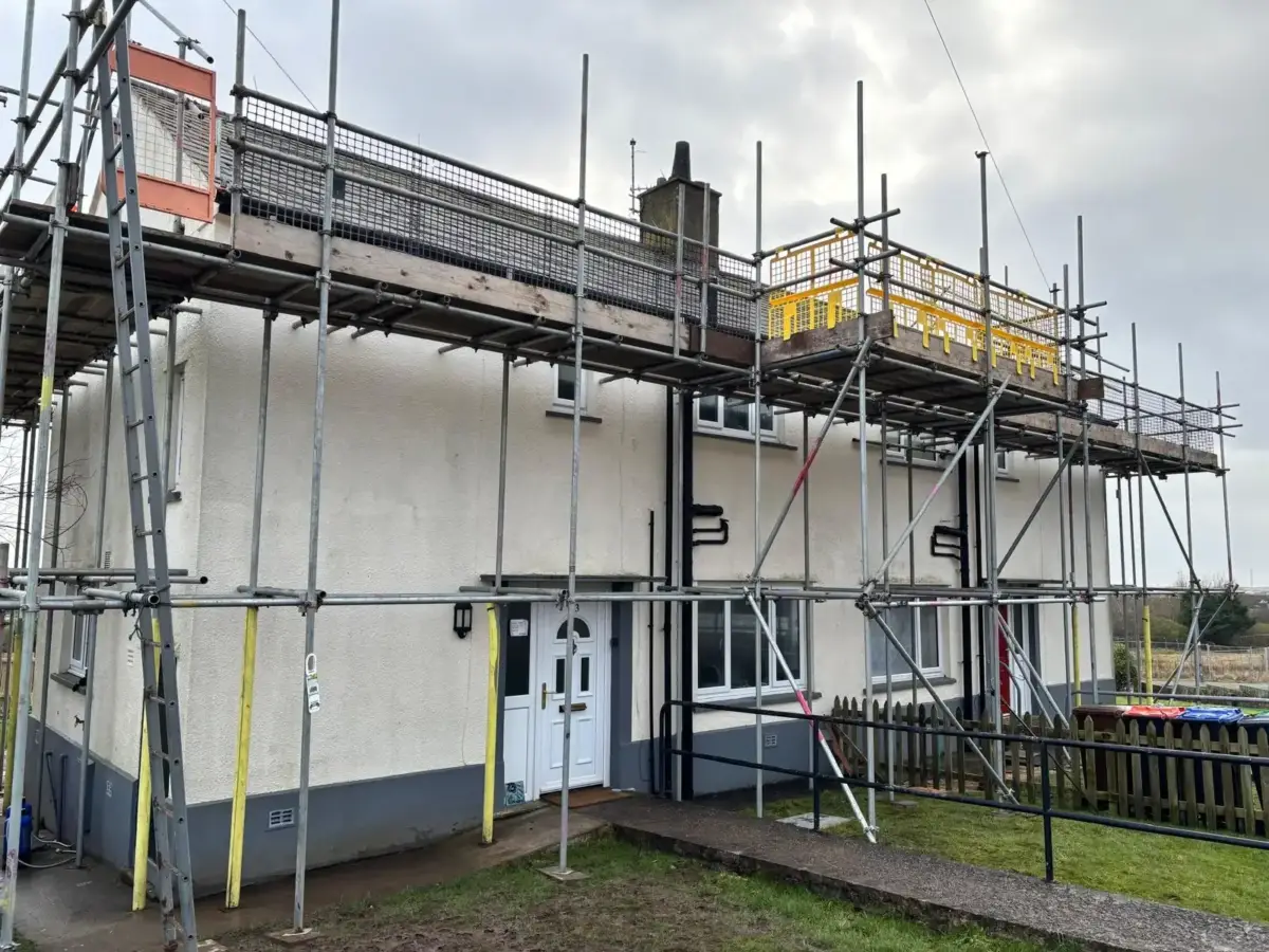 Independent scaffolding for external wall insulation on housing in Barrow-in-Furness