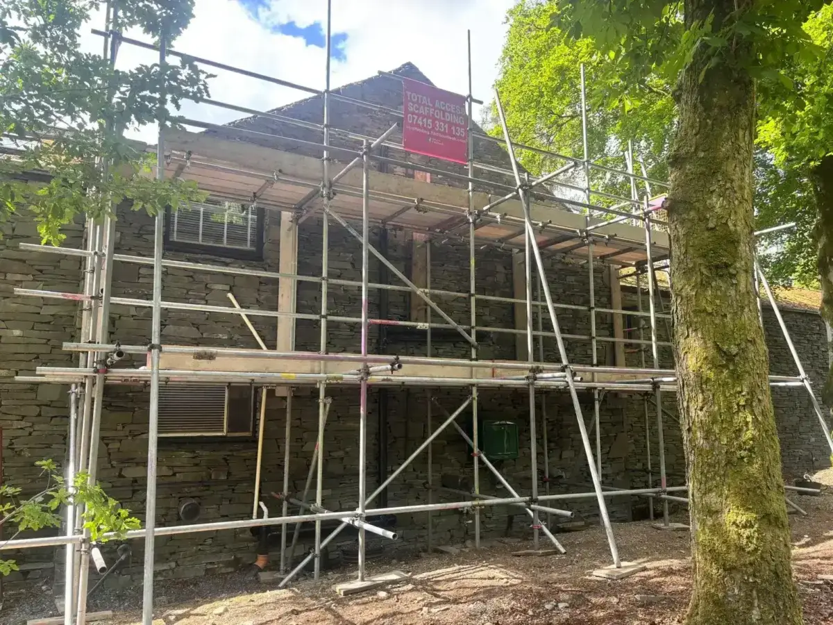 Full house wrap scaffolding on residential property for re-roofing in Cumbria