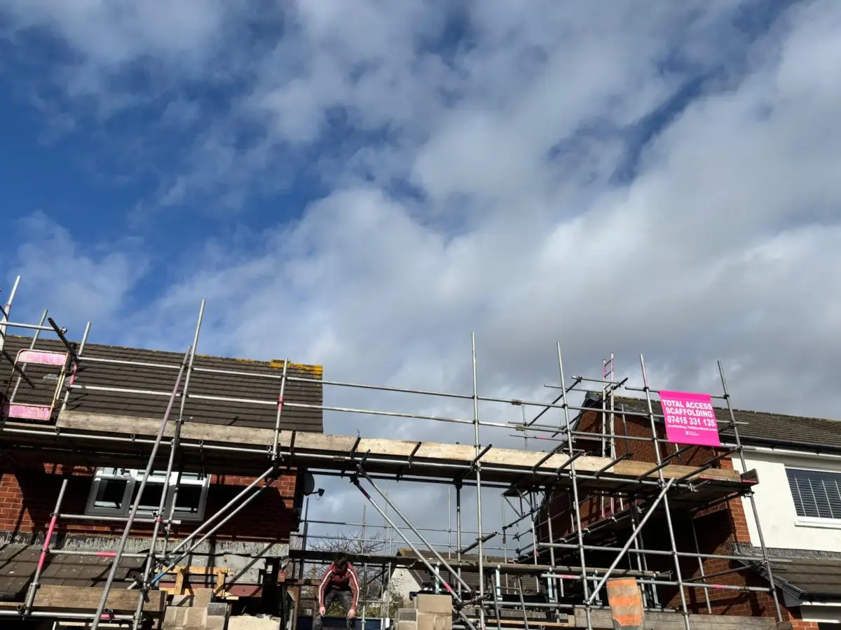 Scaffolding wrap on lakeland property for slate roof repair and repointing
