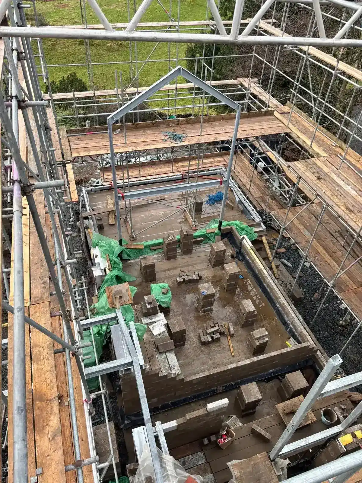 Interior view of temporary roofing scaffold canopy during installation
